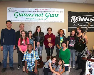 HAPPY HOLIDAYS FROM GUITARS NOT GUNS!  THANK YOU FOR AN AMAZING YEAR!